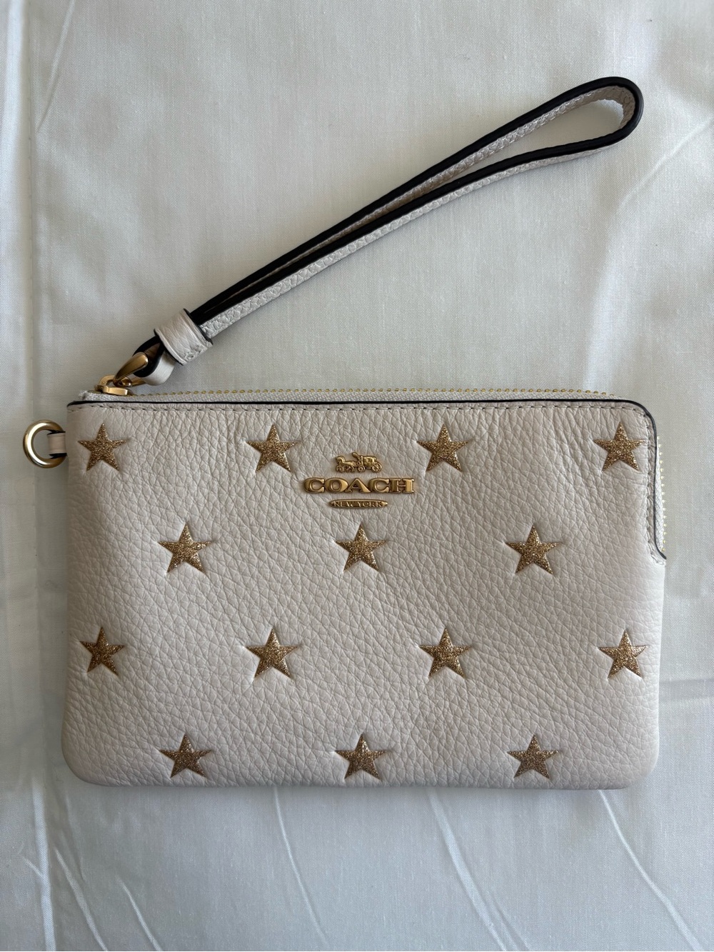 Coach Cream Wristlet with Gold Star Accents